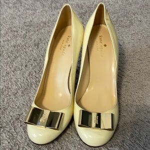 Kate Spade Yellow Pumps with Gold Bow